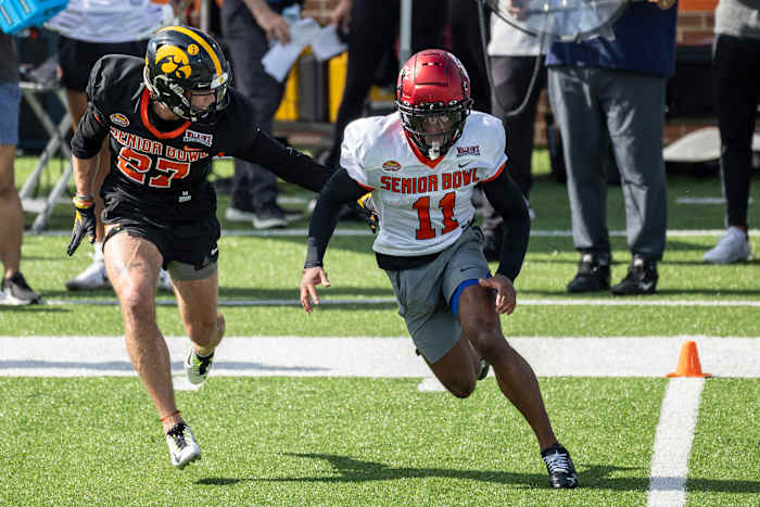 Jan 31, 2023; Mobile, AL, USA; National defensive back Riley Moss of Iowa (27) practices with National wide receiver Tre Tucker of Cincinnati (11) during the first day of Senior Bowl week at Hancock Whitney Stadium in Mobile. Mandatory Credit: Vasha Hunt-USA TODAY Sports